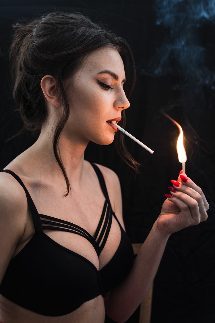 Black haired woman having smoking