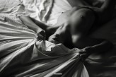 UnryPhotography Nude girl portrait in bed.