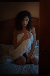 ksenos Low light boudoir portrait featuring Kasia.