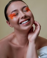 blachovska Glowing skin, hollywood smile. Orange became my new favourite colour! 
Photo: Cliffson Adu
Makeup: Emilia Tomczak-Stosiak
