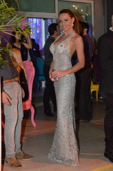 larus                             Top-model Dorota Nowak na inauguracji kalendarza ,,Acasami,, w Miami w sukience od Larol Design             