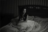 UnryPhotography Nude girl portrait in bed.