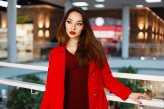 Alonesdj Beautiful young girl in a red dress is shopping