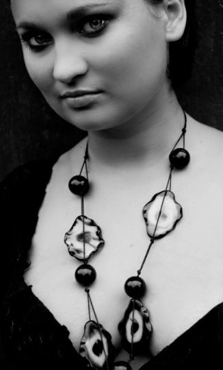 izeta She is black and white