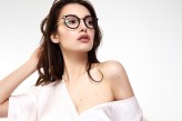 tshemetovskyi Attractive Brunette Girl With Natural Face Makeup In Transparent Glasses Frame